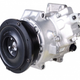 Traditional belt-driven AC Compressor. Photo: Denso